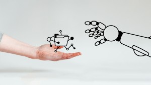 Menschliche Hand reicht Daten zu Roboter Hand